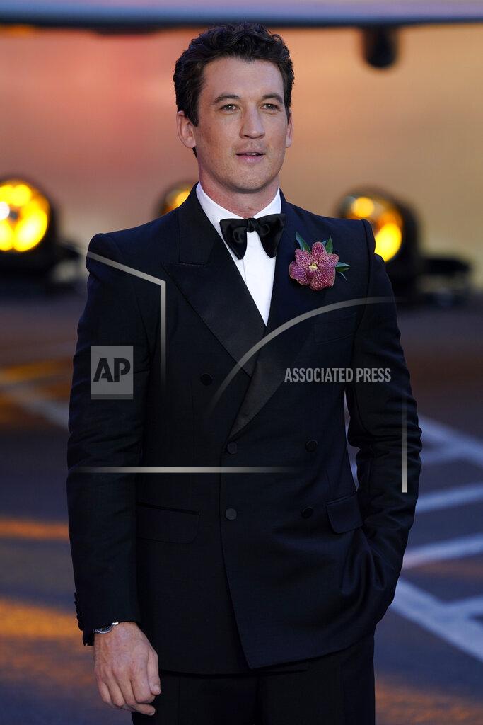 Alberto Pezzali Miles Teller poses for the media during the 'Top Gun Maverick' UK premiere at a central London cinema, on Thursday, May 19, 2022. (AP Photo/Alberto Pezzali)