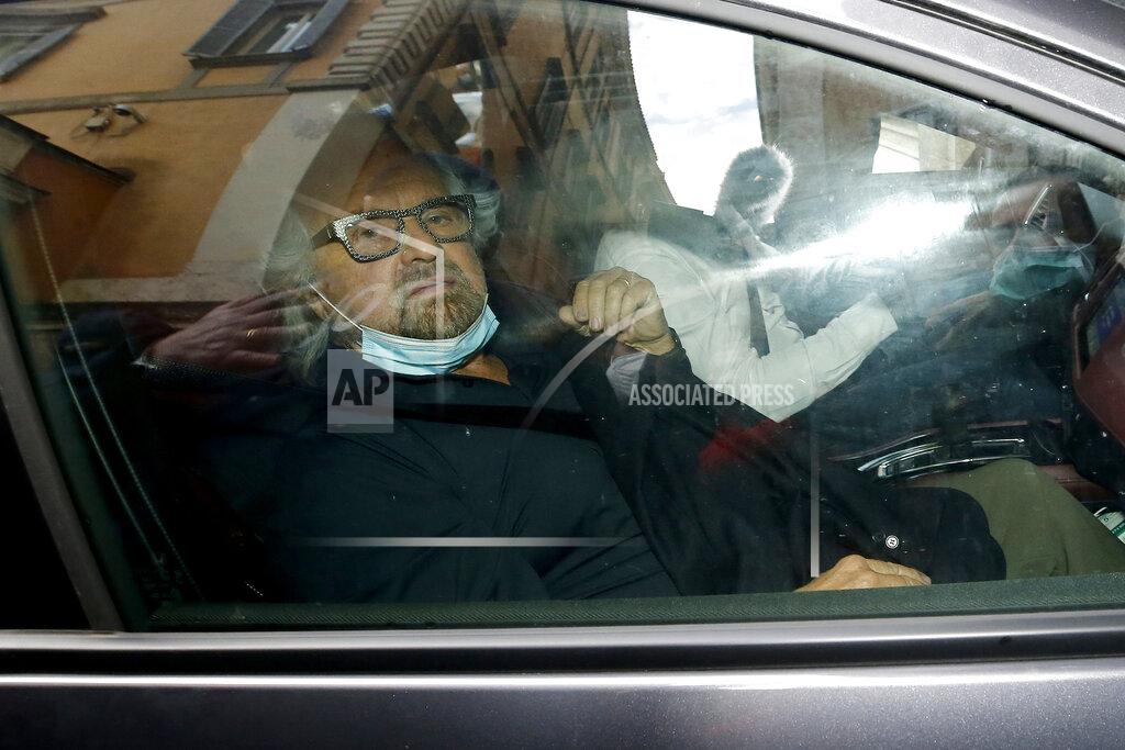 Cecilia Fabiano Five Star Movement's Beppe Grillo arrives to meet with former European Central Bank chief Mario Draghi, at the Chamber of Deputies, in Rome, Tuesday, Feb. 9, 2021. Draghi has secured pledges of backing from nearly every party in the Italian Parliament as he wrapped up political consultations Tuesday aimed at giving the pandemic-ravaged nation a new government, likely later this week. (Cecilia Fabiano/LaPresse via AP)