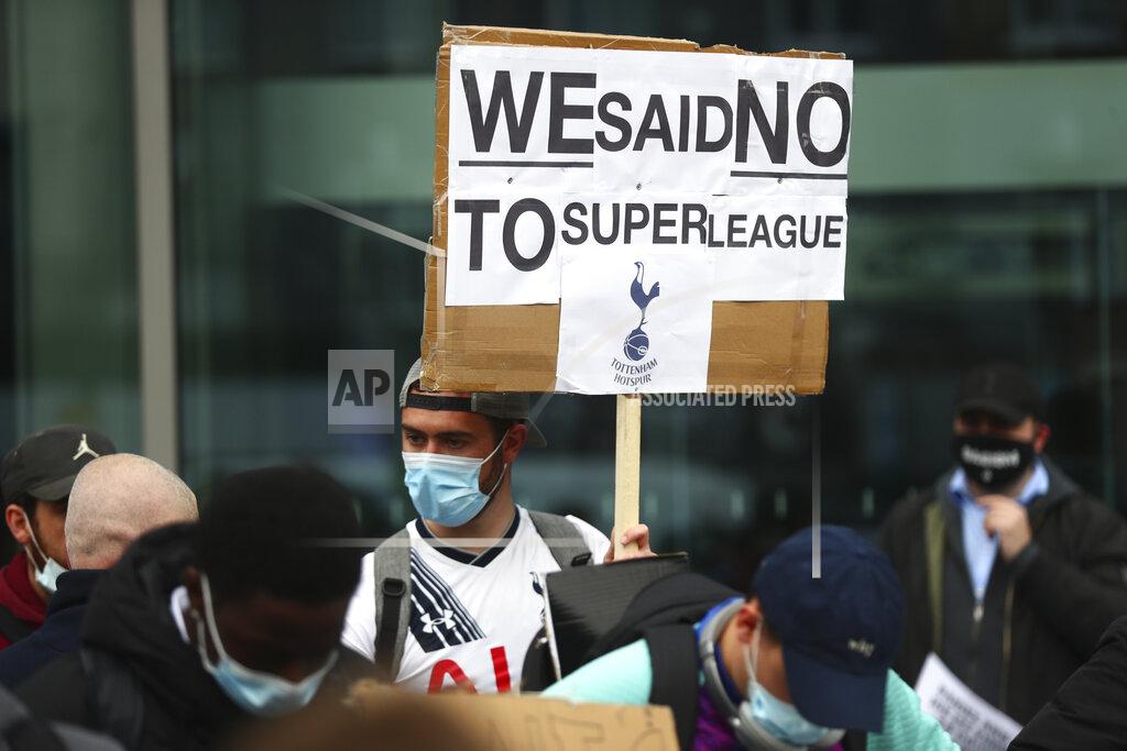 Clive Rose Tottenham fans stage a protest against the Board over the planned creation of a European Super League, outside the Tottenham Hotspur Stadium ahead of the English Premier League football match between Tottenham Hotspur and Southampton in London, England, Wednesday April 21, 2021. (Clive Rose/Pool via AP)
