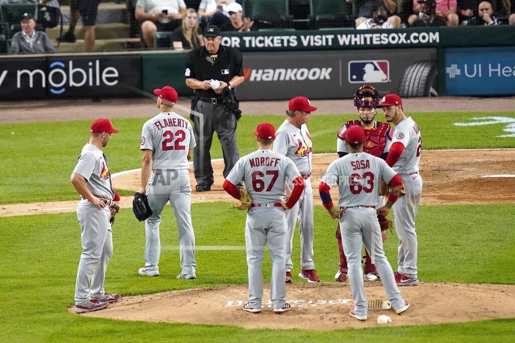 Charles Rex Arbogast St. Louis Cardinals starting pitcher Jack Flaherty (22) walks to the dugout after being pulled from an interleague baseball game by manager Mike Shildt in the fourth inning against the Chicago White Sox Tuesday, May 25, 2021, in Chicago. (AP Photo/Charles Rex Arbogast)