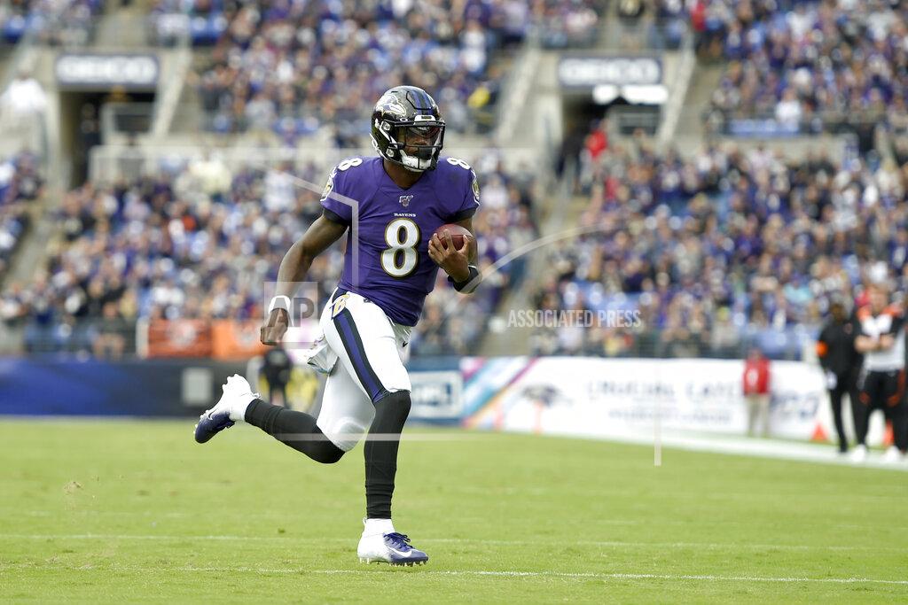 Gail Burton Baltimore Ravens quarterback Lamar Jackson runs for a touchdown against the Cincinnati Bengals during the first half of a NFL football game Sunday, Oct. 13, 2019, in Baltimore. (AP Photo/Gail Burton)