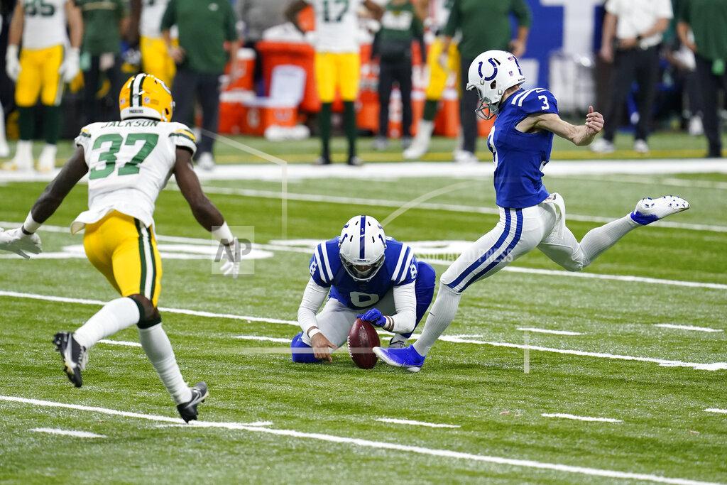 Michael Conroy Indianapolis Colts kicker Rodrigo Blankenship (3) boots a 43-yard field goal out of the hold of Rigoberto Sanchez (8) during the second half of an NFL football game against the Green Bay Packers, Sunday, Nov. 22, 2020, in Indianapolis. (AP Photo/Michael Conroy)