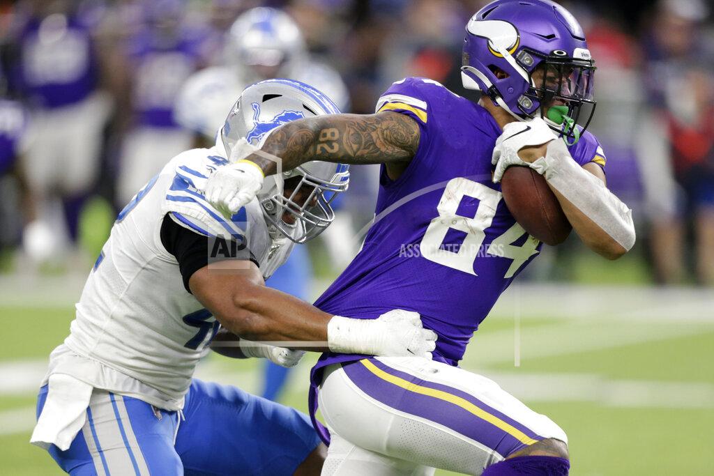 Andy Clayton-King Minnesota Vikings tight end Irv Smith tries to break a tackle by Detroit Lions outside linebacker Devon Kennard, left, after catching a pass during the second half of an NFL football game, Sunday, Dec. 8, 2019, in Minneapolis. (AP Photo/Andy Clayton-King)