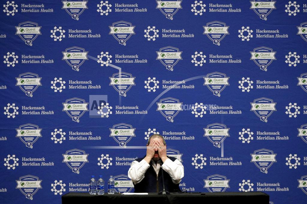 Julio Cortez New York Giants general manager Dave Gettleman grabs his face while speaking during an end-of-season press conference at the NFL football team's training facility, Wednesday, Jan. 2, 2019, in East Rutherford, N.J. The Giants finished with a record of 5-11, last in the NFC East division. (AP Photo/Julio Cortez)