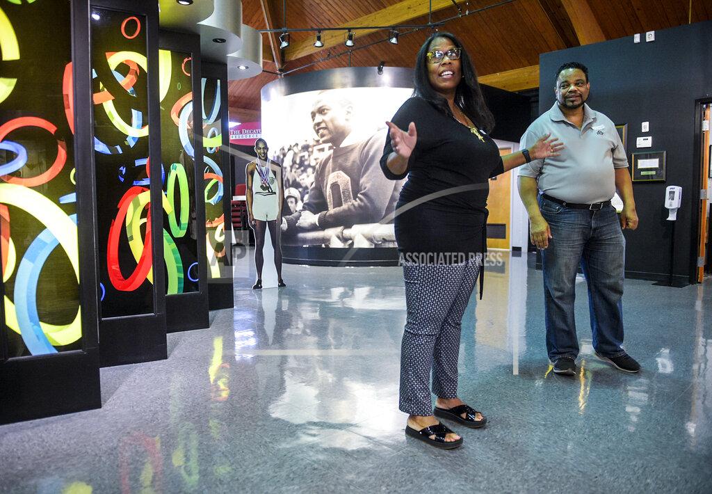 Jeronimo Nisa Marlene Dortch, granddaughter of Jesse Owens, visits the Jesse Owens Museum with her husband, Llewellyn Dortch, on Tuesday, July 20, 2021. (Jeronimo Nisa/The Decatur Daily via AP)