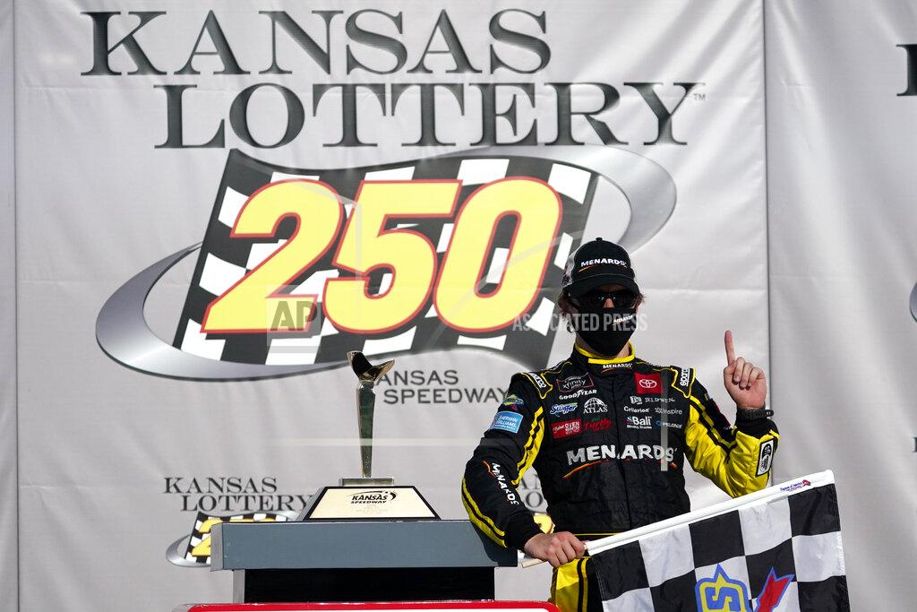 Charlie Riedel Brandon Jones celebrates after winning a NASCAR Xfinity Series auto race at Kansas Speedway in Kansas City, Kan., Saturday, July 25, 2020. (AP Photo/Charlie Riedel)