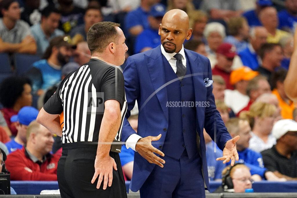 Chris O'meara Vanderbilt head coach Jerry Stackhouse, right, questions an official during the first half of an NCAA men's college basketball Southeastern Conference tournament game against Alabama, Thursday, March 10, 2022, in Tampa, Fla. (AP Photo/Chris O'Meara)
