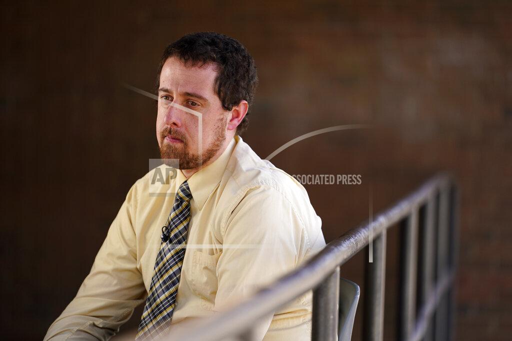 Matt Slocum Panther Valley Elementary School Principal Rob Palazzo pauses during an interview at the school in Nesquehoning, Pa., on Thursday, March 11, 2021. On May 26, 2020, former student, 9-year-old Ava Lerario; her mother, Ashley Belson, and Ava's father, Marc Lerario, were found fatally shot inside their home. Palazzo says he and the rest of the school and community are grappling with the what-ifs: What if school had been open, and they had a chance to save Ava? (AP Photo/Matt Slocum)