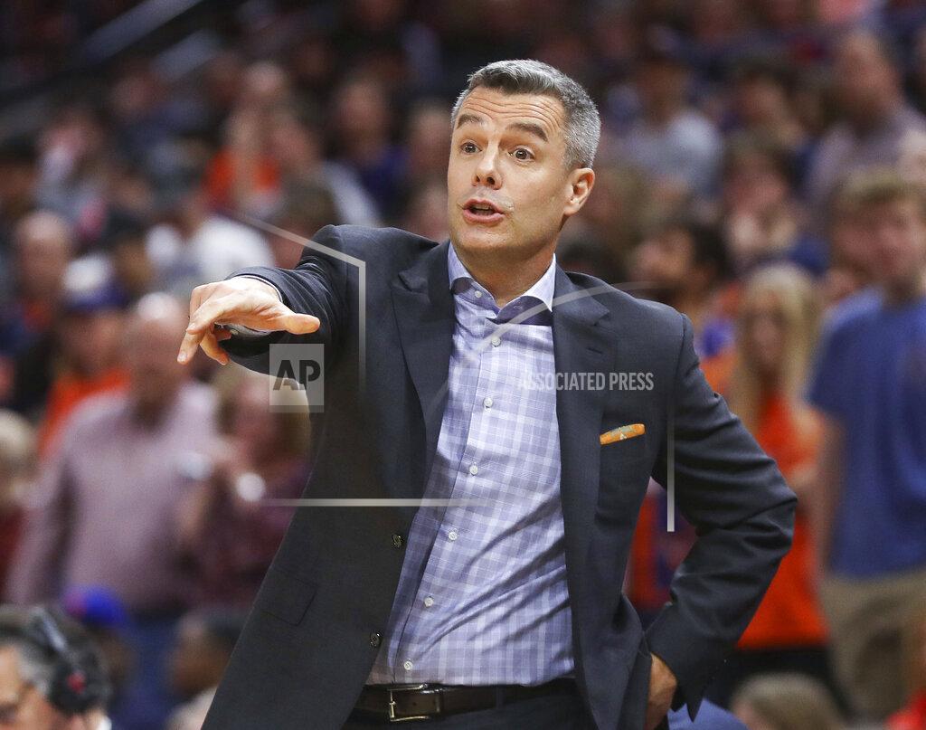 Andrew Shurtleff Virginia head coach Tony Bennett reacts to a call during an NCAA college basketball game against Navy in Charlottesville, Va., Sunday, Dec. 29, 2019. (AP Photo/Andrew Shurtleff)