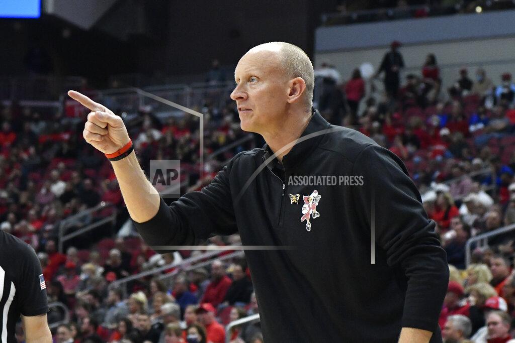 Timothy D. Easley Louisville coach Chris Mack points to one of the team's players during the second half of an NCAA college basketball game against DePaul in Louisville, Ky., Friday, Dec. 10, 2021. (AP Photo/Timothy D. Easley)