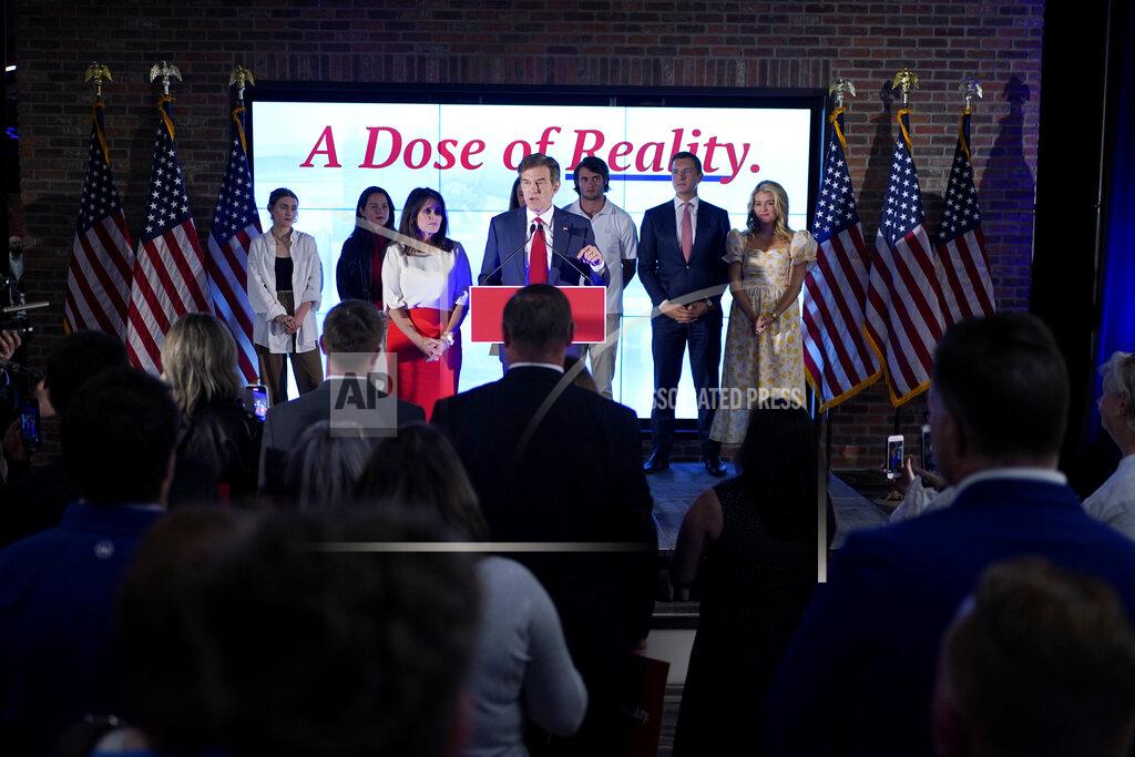 Seth Wenig Mehmet Oz, a Republican candidate for U.S. Senate in Pennsylvania, speaks to supporters at a primary night election gathering in Newtown, Pa., Tuesday, May 17, 2022. (AP Photo/Seth Wenig)