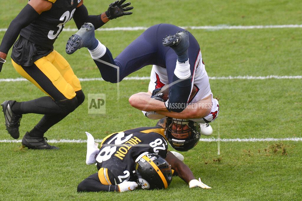 Don Wright Houston Texans running back Cullen Gillaspia (44) tumbles over Pittsburgh Steelers cornerback Mike Hilton (28) on a run in the first half of an NFL football game, Sunday, Sept. 27, 2020, in Pittsburgh. (AP Photo/Don Wright)