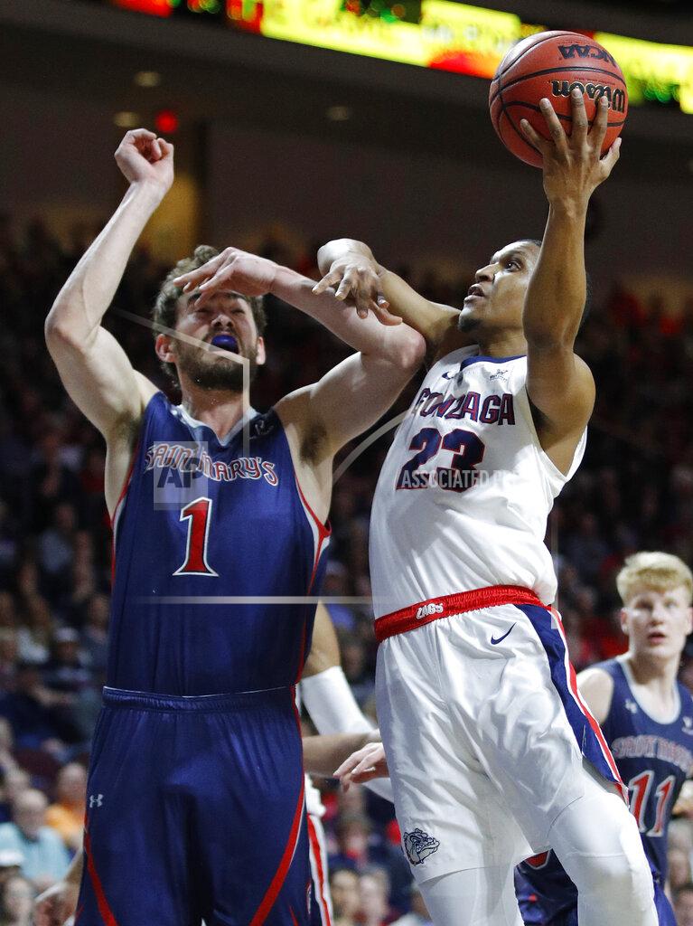 John Locher Gonzaga's Zach Norvell Jr. (23) shoots around St. Mary's Jordan Hunter during the first half of an NCAA college basketball game for the West Coast Conference men's tournament title, Tuesday, March 12, 2019, in Las Vegas. (AP Photo/John Locher)