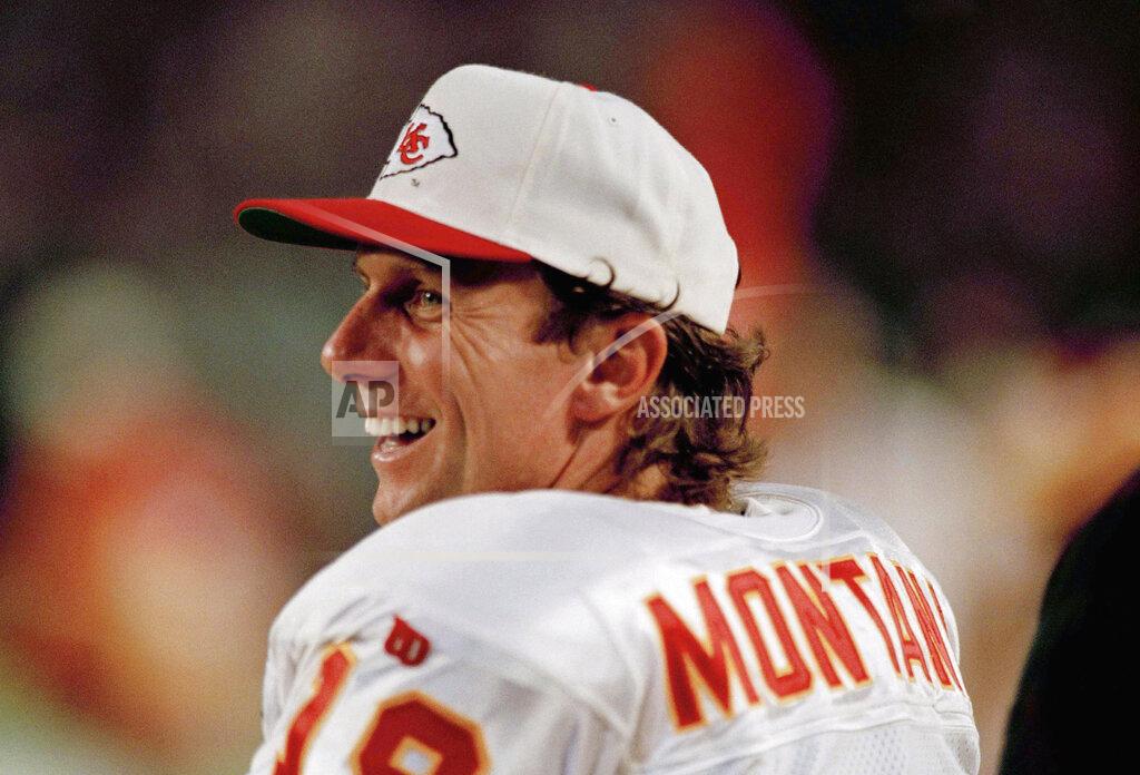 Han Deryk FILE - In this Dec. 12, 1994 file photo Kansas City Chief's quarterback Joe Montana watches from the sidelines during an NFL football game against the Miami Dolphins. Tom Brady’s departure from the New England Patriots on Tuesday, March 17, 2020 brings an end to one of the NFL’s most memorable eras. Joe Montana was in some ways a previous generation’s version of Brady — an iconic quarterback who was calm under pressure and always seemed to have his team in contention for a championship. He won four Super Bowl titles with San Francisco, but after elbow problems limited him for a couple seasons, the 49ers traded Montana to Kansas City. The Chiefs had Montana for two seasons and reached the AFC title game with him once. (AP Photo/Han Deryk, file)