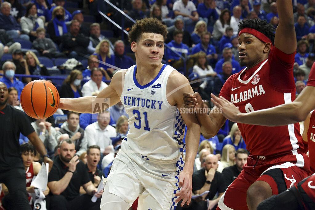James Crisp Kentucky's Kellan Grady (31) drives as Alabama's Noah Gurley, right, defends during the first half of an NCAA college basketball game in Lexington, Ky., Saturday, Feb. 19, 2022. (AP Photo/James Crisp)