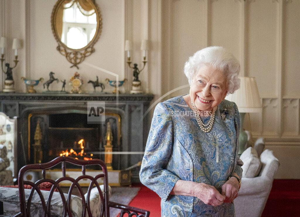 Dominic Lipinski FILE - Britain's Queen Elizabeth II wears a paisley print dress while receiving the President of Switzerland Ignazio Cassis and his wife Paola Cassis during an audience at Windsor Castle in Windsor, England on April 28, 2022. (Dominic Lipinski/Pool Photo via AP, File)