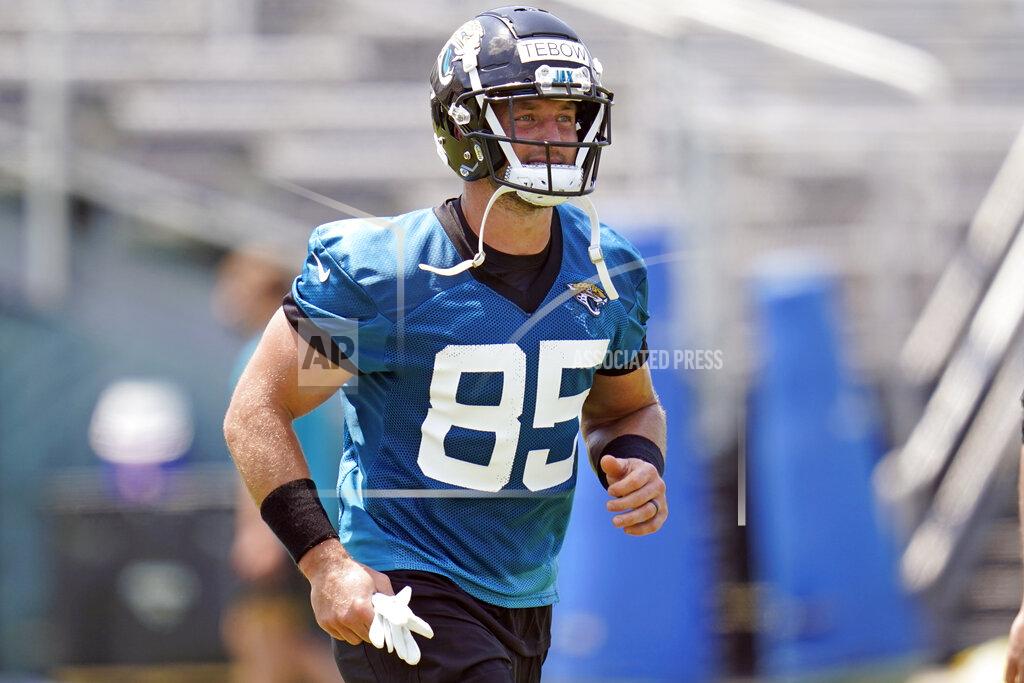 John Raoux Jacksonville Jaguars tight end Tim Tebow runs on the field during an NFL football team practice, Thursday, May 27, 2021, in Jacksonville, Fla. (AP Photo/John Raoux)