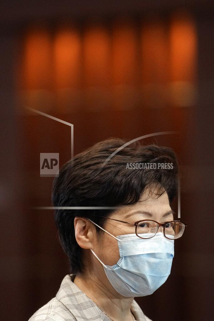 Vincent Yu Hong Kong Chief Executive Carrie Lam speaks during a press conference at a polling center for the election committee that will vote for the city's leader in Hong Kong Sunday, Sept. 19, 2021. Hong Kong's polls for an election committee that will vote for the city's leader kicked off Sunday amid heavy police presence, with chief executive Carrie Lam saying that it is "very meaningful" as it is the first election to take place following electoral reforms. (AP Photo/Vincent Yu)
