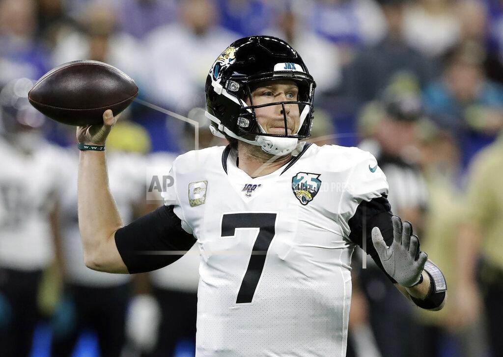 Darron Cummings FILE - In this Nov. 17, 2019, file photo, Jacksonville Jaguars quarterback Nick Foles (7) throws during the first half of an NFL football game against the Indianapolis Colts in Indianapolis. Mitchell Trubisky insists he is one motivated quarterback. He comes into a make-or-break season locked in a competition with former Super Bowl MVP Foles for the Bears' quarterback job, knowing his future as a starter in Chicago and maybe anywhere else is on the line. (AP Photo/Darron Cummings, File)