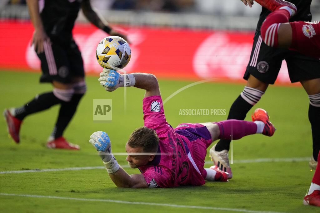 Rebecca Blackwell Inter Miami goalkeeper Nick Marsman, center, dives to deflect a shot during the first half of an MLS soccer match against the New York Red Bulls, Friday, Sept. 17, 2021, in Fort Lauderdale, Fla. (AP Photo/Rebecca Blackwell)