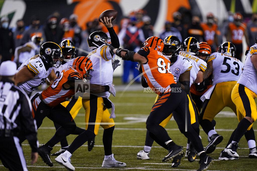Bryan Woolston Pittsburgh Steelers quarterback Ben Roethlisberger (7) is hit as he throws during the second half of an NFL football game against the Cincinnati Bengals, Monday, Dec. 21, 2020, in Cincinnati. (AP Photo/Bryan Woolston)