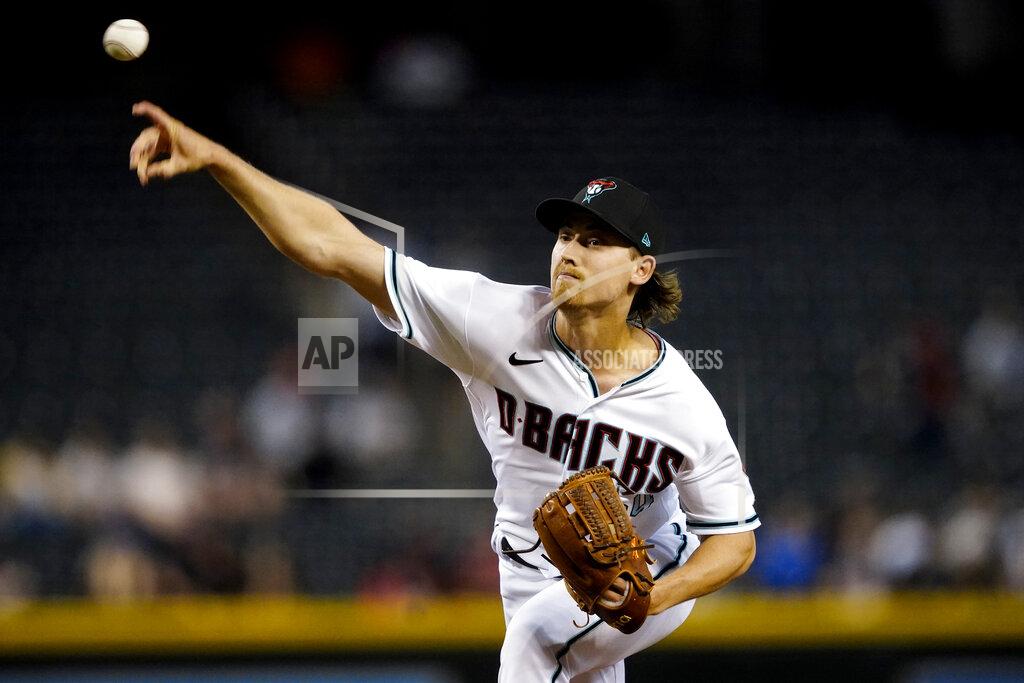 Matt York Arizona Diamondbacks starting pitcher Luke Weaver throws against the Atlanta Braves during the first inning of a baseball game, Tuesday, Sept. 21, 2021, in Phoenix. (AP Photo/Matt York)