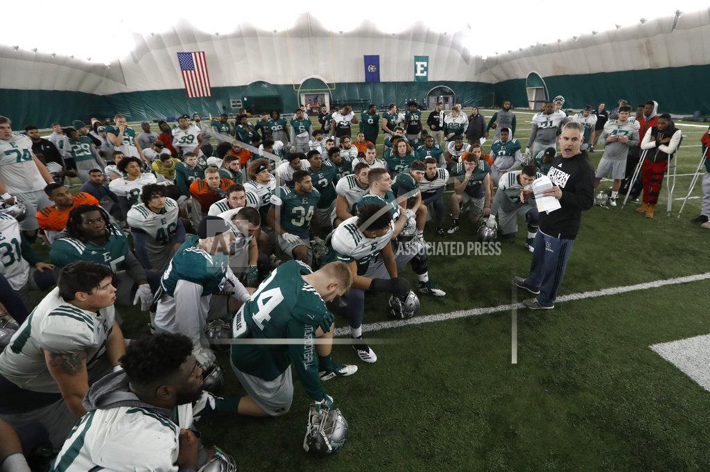 Paul Sancya Eastern Michigan football coach Chris Creighton talks to the team during practice in Ypsilanti, Mich., Monday, Dec. 10, 2018. Eastern Michigan's football team has stepped out of the shadows created by the neighboring University of Michigan and four professional teams just down the road in the Motor City. The Eagles will face Georgia Southern in the Camellia Bowl on Saturday, earning a spot in postseason play for the second time in three years and just the third time in school history. (AP Photo/Paul Sancya)