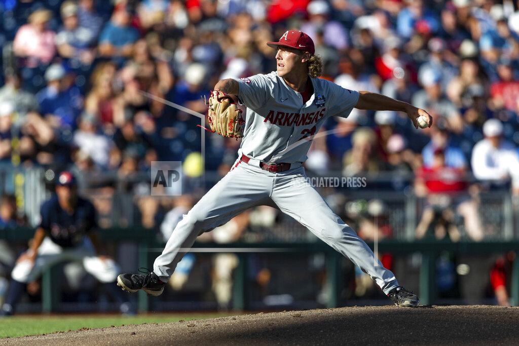 John Peterson Arkansas starting pitcher Hagen Smith (33) throws in the first inning against Mississippi during an NCAA College World Series baseball game Wednesday, June 22, 2022, in Omaha, Neb. (AP Photo/John Peterson)