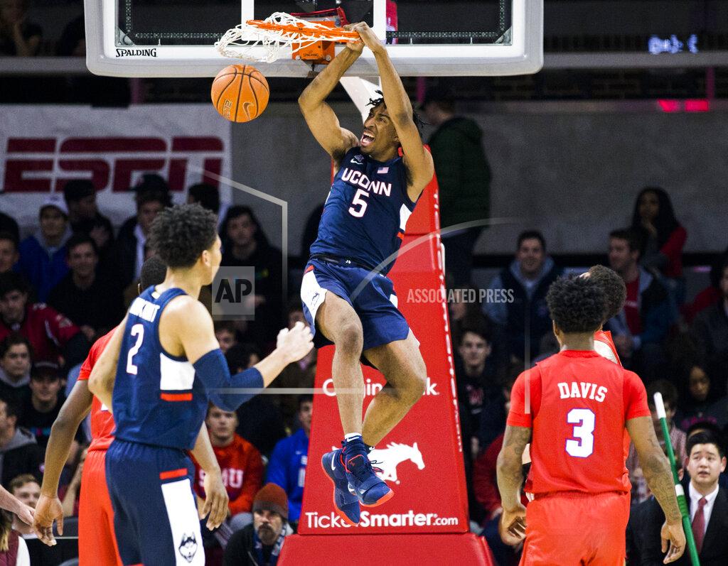 Ashley Landis Connecticut forward Isaiah Whaley (5) dunks the ball during the first half of an NCAA college basketball game against Connecticut Wednesday, Feb. 12, 2020, in Dallas. (Ashley Landis/The Dallas Morning News via AP)