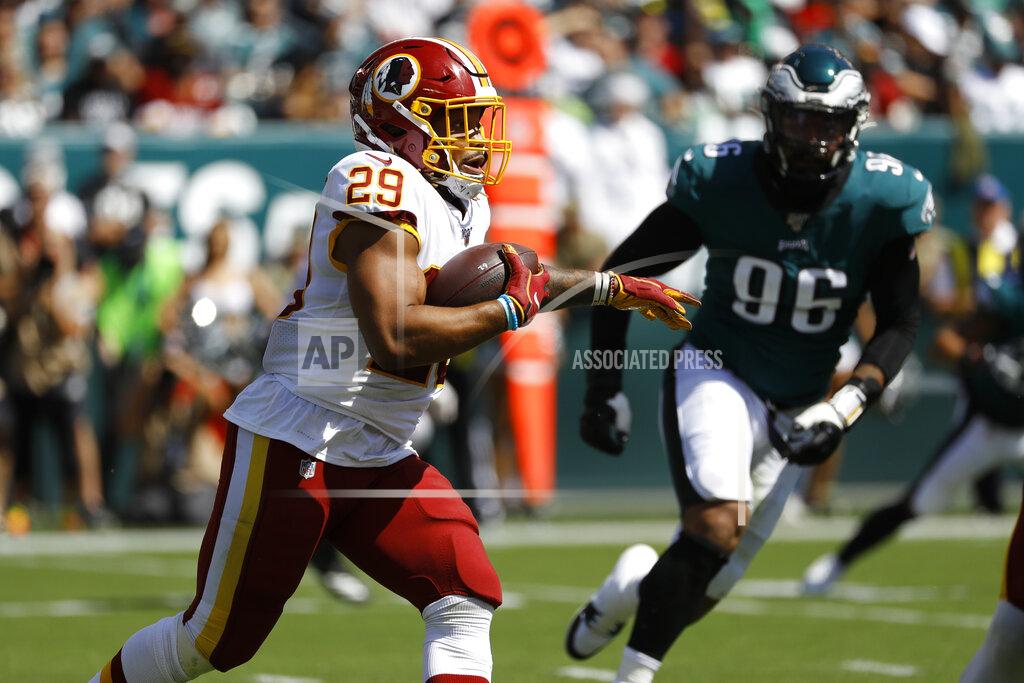 Michael Perez Washington Redskins' Derrius Guice, left, rushes during the first half of an NFL football game against the Philadelphia Eagles, Sunday, Sept. 8, 2019, in Philadelphia. (AP Photo/Michael Perez)