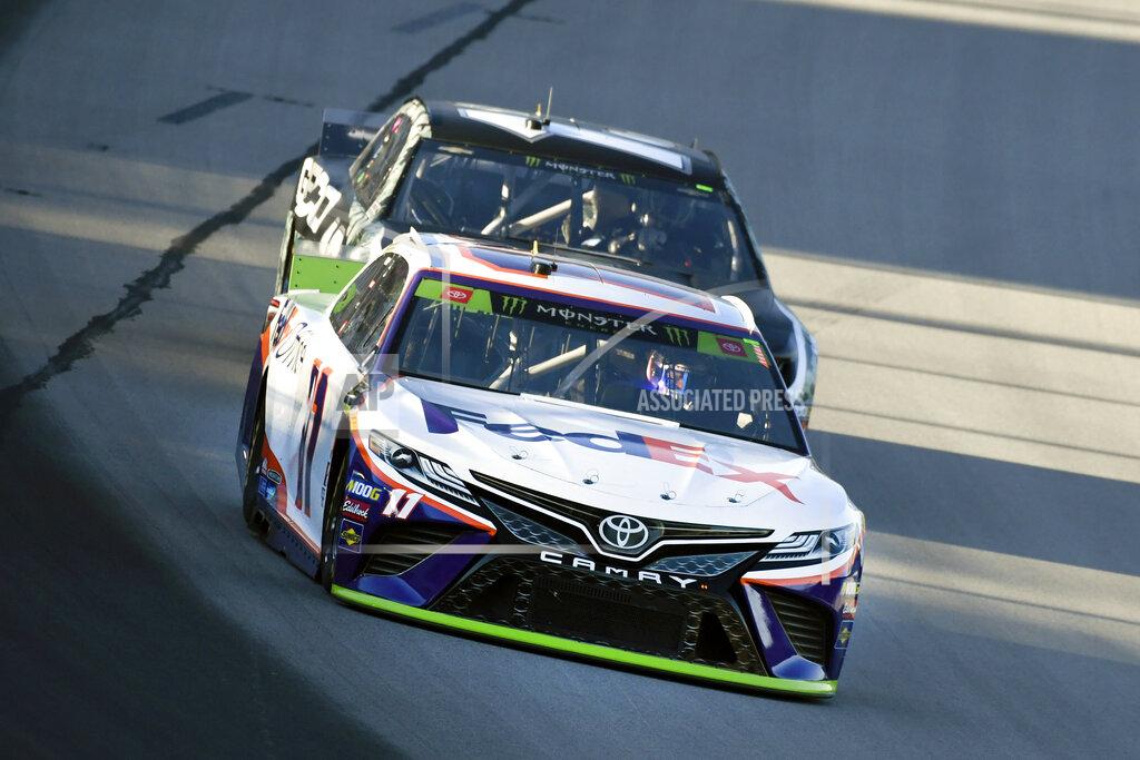 Larry Papke Denny Hamlin heads into Turn 1 during practice for the NASCAR Cup Series auto race at Texas Motor Speedway in Forth Worth, Texas, Friday, Nov. 1, 2019. (AP Photo/Larry Papke)