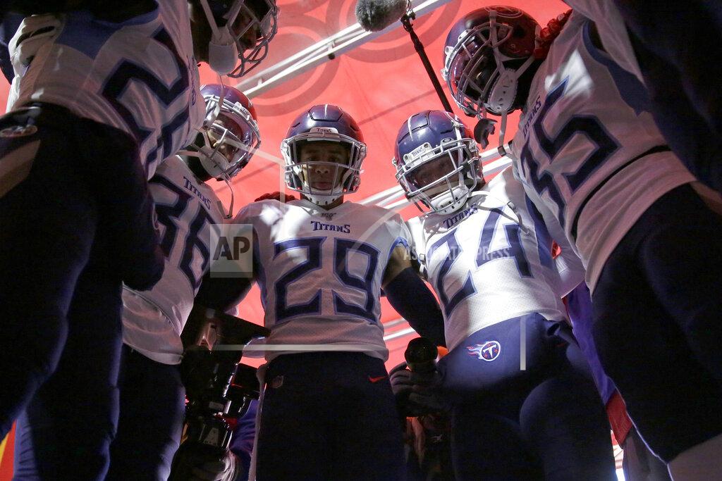 Jeff Roberson Tennessee Titans players huddle in the tunnel before the NFL AFC Championship football game against the Kansas City Chiefs Sunday, Jan. 19, 2020, in Kansas City, MO. (AP Photo/Jeff Roberson)