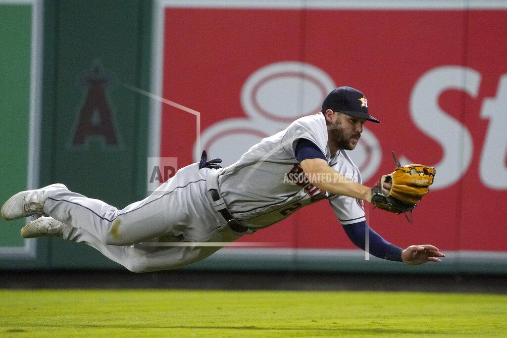 Mark J. Terrill Houston Astros right fielder Chas McCormick makes a catch on a ball hit by Los Angeles Angels' Phil Gosselin during the seventh inning of a baseball game Wednesday, Sept. 22, 2021, in Anaheim, Calif. (AP Photo/Mark J. Terrill)