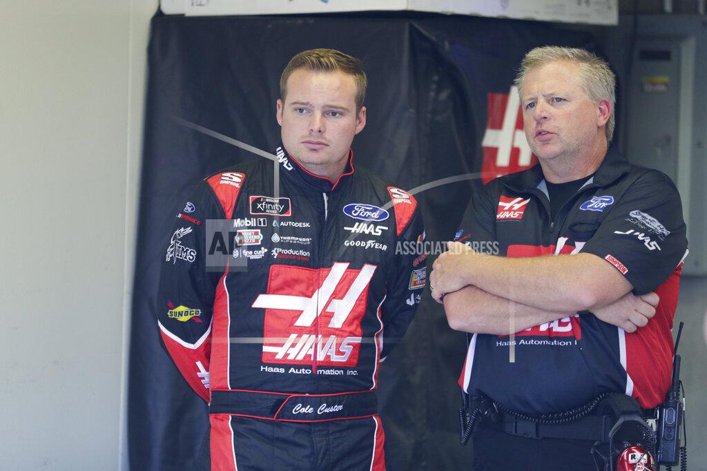 Michael Conroy NASCAR Xfinity Series driver Cole Custer talks with a member of his crew before the start of NASCAR Xfinity auto racing practice at Indianapolis Motor Speedway, Friday, Sept. 6, 2019 in Indianapolis. (AP Photo/Michael Conroy)