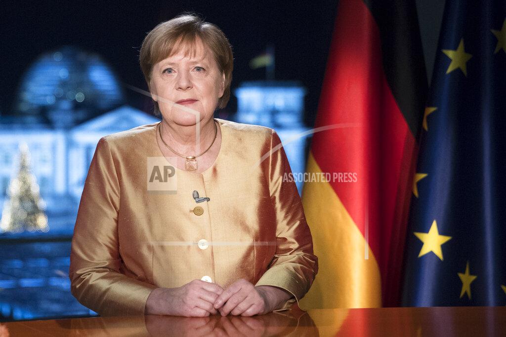 Markus Schreiber FILE - In this Dec. 30, 2020 file photo German Chancellor Angela Merkel poses for photographs after the television recording of her annual New Year's speech at the chancellery in Berlin, Germany. The coronavirus pandemic is colliding with politics as Germany embarks on its vaccination drive and one of the most unpredictable election years in its post-World War II history. (AP Photo/Markus Schreiber, File)