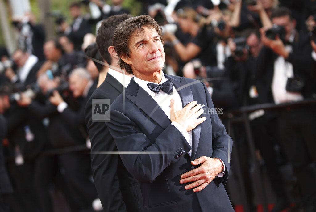 Vianney Le Caer Tom Cruise poses for photographers upon arrival at the premiere of the film 'Top Gun: Maverick' at the 75th international film festival, Cannes, southern France, Wednesday, May 18, 2022. (Photo by Vianney Le Caer/Invision/AP)