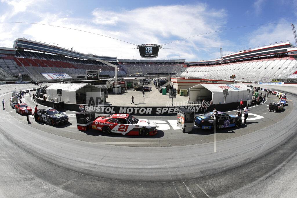 Mark Humphrey In this picture made with a fisheye lens, cars are readied for a NASCAR Xfinity Series auto race at Bristol Motor Speedway Monday, June 1, 2020, in Bristol, Tenn. (AP Photo/Mark Humphrey)