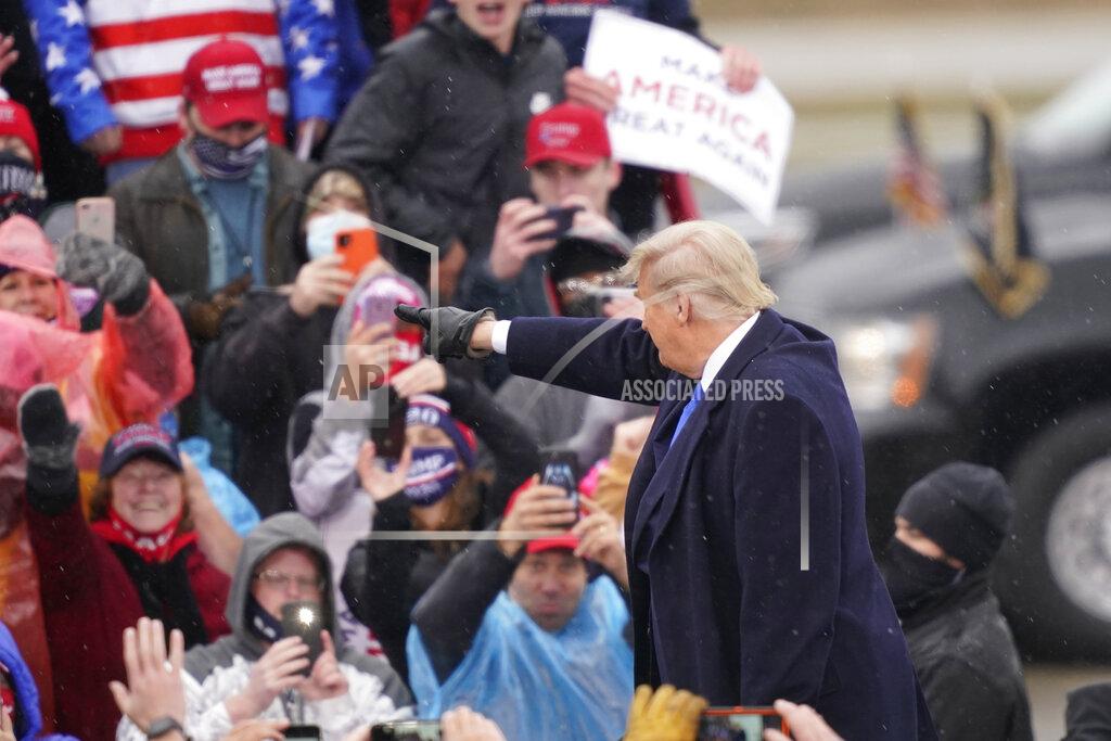 Carlos Osorio President Donald Trump arrives for a campaign rally Tuesday, Oct. 27, 2020, in Lansing, Mich. (AP Photo/Carlos Osorio)