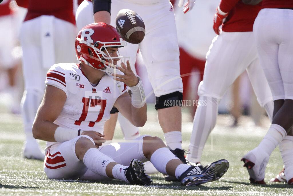 Darron Cummings Rutgers quarterback Johnny Langan (17) tosses the football to an official after getting sacked during the second half of an NCAA college football game against Indiana, Saturday, Oct. 12, 2019, in Bloomington, Ind. Indiana won 35-0. (AP Photo/Darron Cummings)