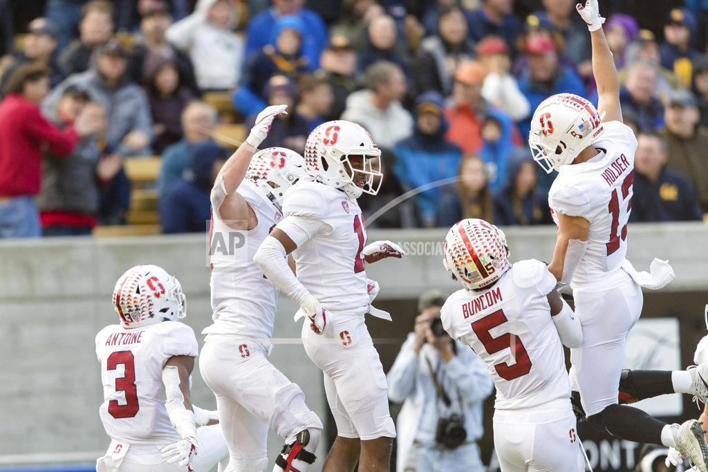 John Hefti Stanford cornerback Paulson Adebo (11) celebrates after intercepting a pass to the end zone by California quarterback Chase Garbers in the fourth quarter of a football game in Berkeley, Calif., Saturday, Dec. 1, 2018. (AP Photo/John Hefti)