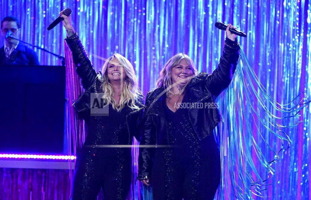 Mark Humphrey Miranda Lambert, left, and Elle King perform at the 56th annual Academy of Country Music Awards on Saturday, April 17, 2021, at the Grand Ole Opry in Nashville, Tenn. The awards show airs on April 18 with both live and prerecorded segments. (AP Photo/Mark Humphrey)