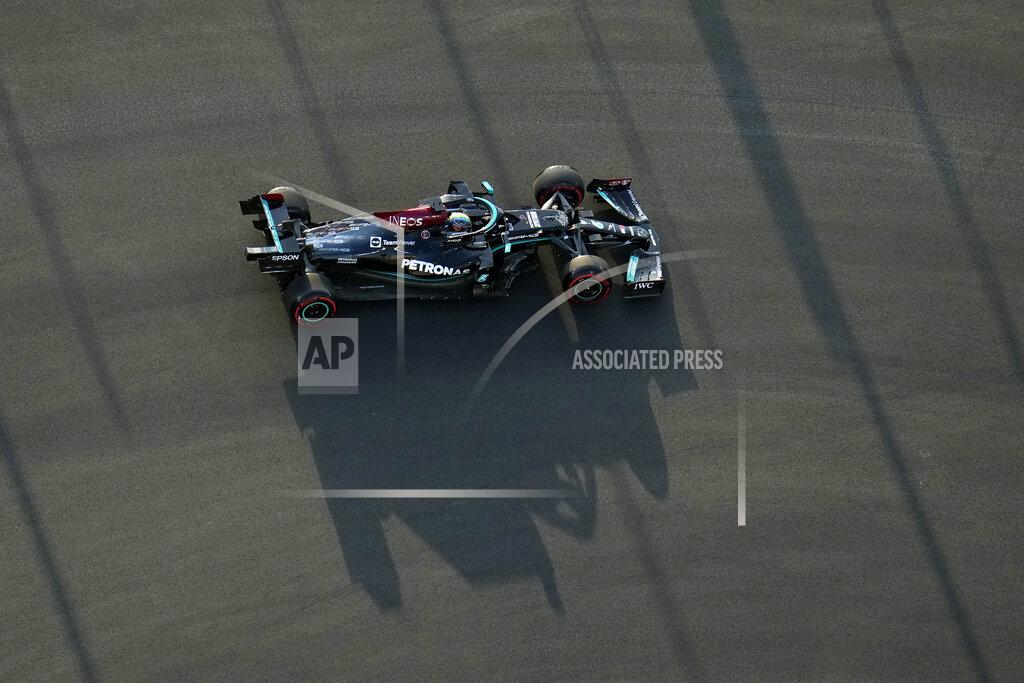 Hassan Ammar Mercedes driver Lewis Hamilton of Britain in action during practice session for the Saudi Arabian Grand Prix in Jiddah, Friday, Dec. 3, 2021. (AP Photo/Hassan Ammar)
