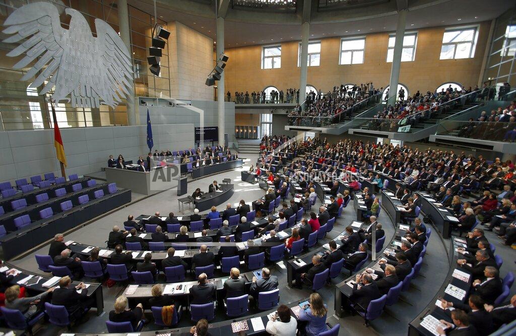 Michael Sohn FILE - This Oct. 22, 2013 file photo shows a general view of the German Federal Parliament, Bundestag in Berlin, Germany. German voters elect a new parliament on Sunday, Sept. 26, 2021, a vote that will determine who succeeds Chancellor Angela Merkel after her 16 years in power. (AP Photo/Michael Sohn, file)