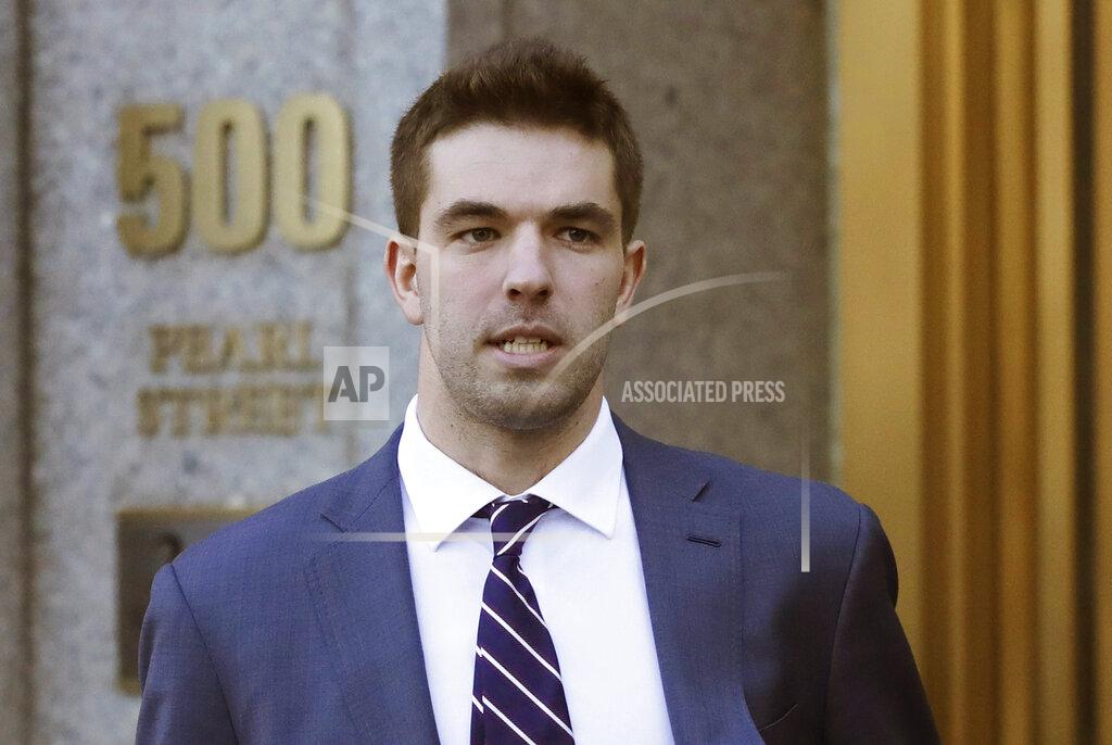 FILE - In this March 6, 2018 file photo, Billy McFarland, the promoter of the failed Fyre Festival in the Bahamas, leaves federal court after pleading guilty to wire fraud charges in New York. More than three years after the highly publicized Fyre Festival famously fizzled out in the Bahamas, merchandise and other
