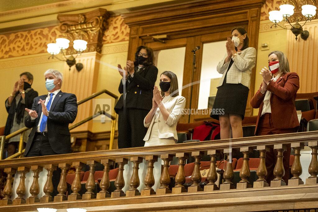 Alyssa Pointer Members of the Georgia House of Representatives applaud the re-election of Georgia Speaker of the House David Ralston, R-Blue Ridge, during the first day of the 2021 legislative session at the Georgia State Capitol building in downtown Atlanta, Monday, Jan. 11, 2021. (Alyssa Pointer/Atlanta Journal-Constitution via AP)