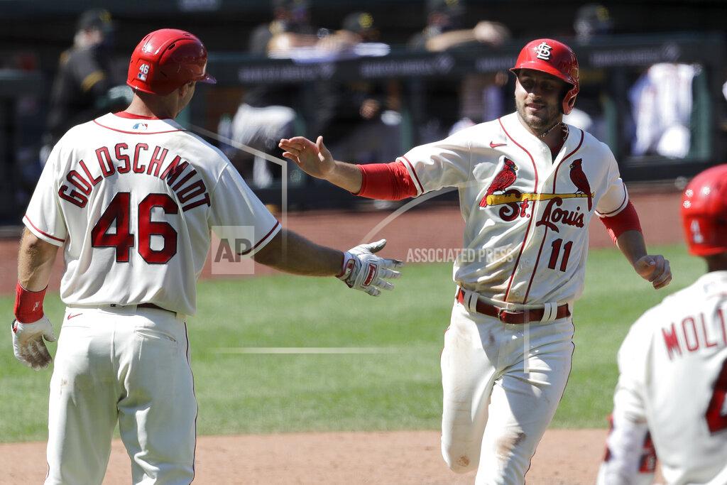Jeff Roberson St. Louis Cardinals' Paul DeJong (11) celebrates with Paul Goldschmidt (46) after both players scored on a double by Matt Carpenter during the eighth inning of a baseball game against the Pittsburgh Pirates Saturday, July 25, 2020, in St. Louis. The Cardinals won 9-1. (AP Photo/Jeff Roberson)