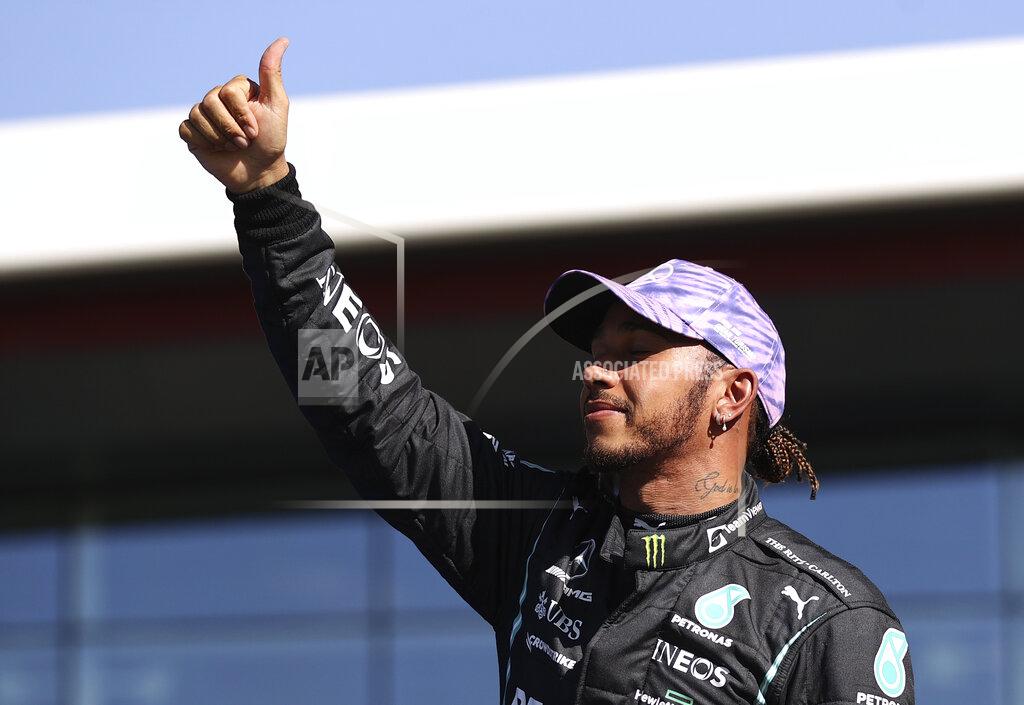 Lars Baron Mercedes driver Lewis Hamilton of Britain gives a thumbs up after the Sprint Qualifying of the British Formula One Grand Prix, at the Silverstone circuit, in Silverstone, England, Saturday, July 17, 2021. The British Formula One Grand Prix will be held on Sunday. (Lars Baron/Pool via AP)