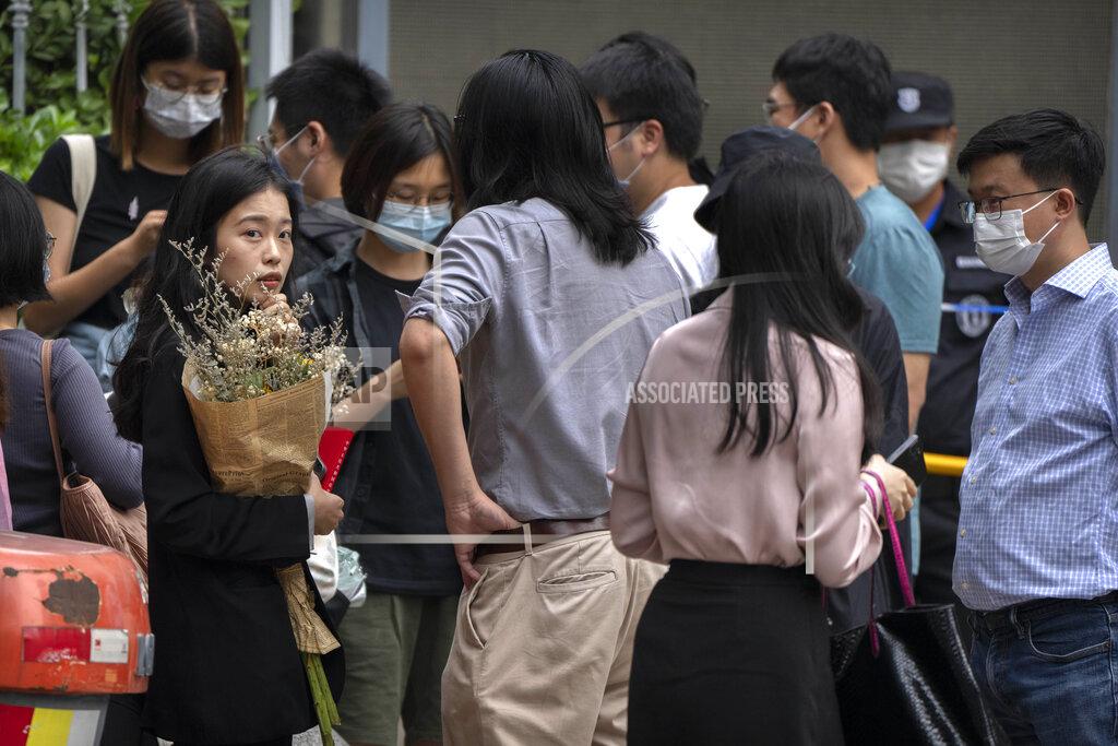 Mark Schiefelbein Zhou Xiaoxuan, left, a former intern at China's state broadcaster CCTV, arrives to attend a court session at a courthouse in Beijing, Tuesday, Sept. 14, 2021. Zhou became the face of the country's MeToo movement after going public with accusations against a prominent CCTV host in 2018. Since then, even as the movement was shut down by authorities, Zhou has continued to speak out. (AP Photo/Mark Schiefelbein)