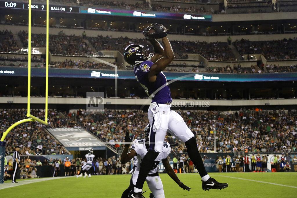 Michael Perez Baltimore Ravens' Jaleel Scott, top, catches a touchdown against Philadelphia Eagles' Jeremiah McKinnon (38) during the first half of a preseason NFL football game, Thursday, Aug. 22, 2019, in Philadelphia. (AP Photo/Michael Perez)
