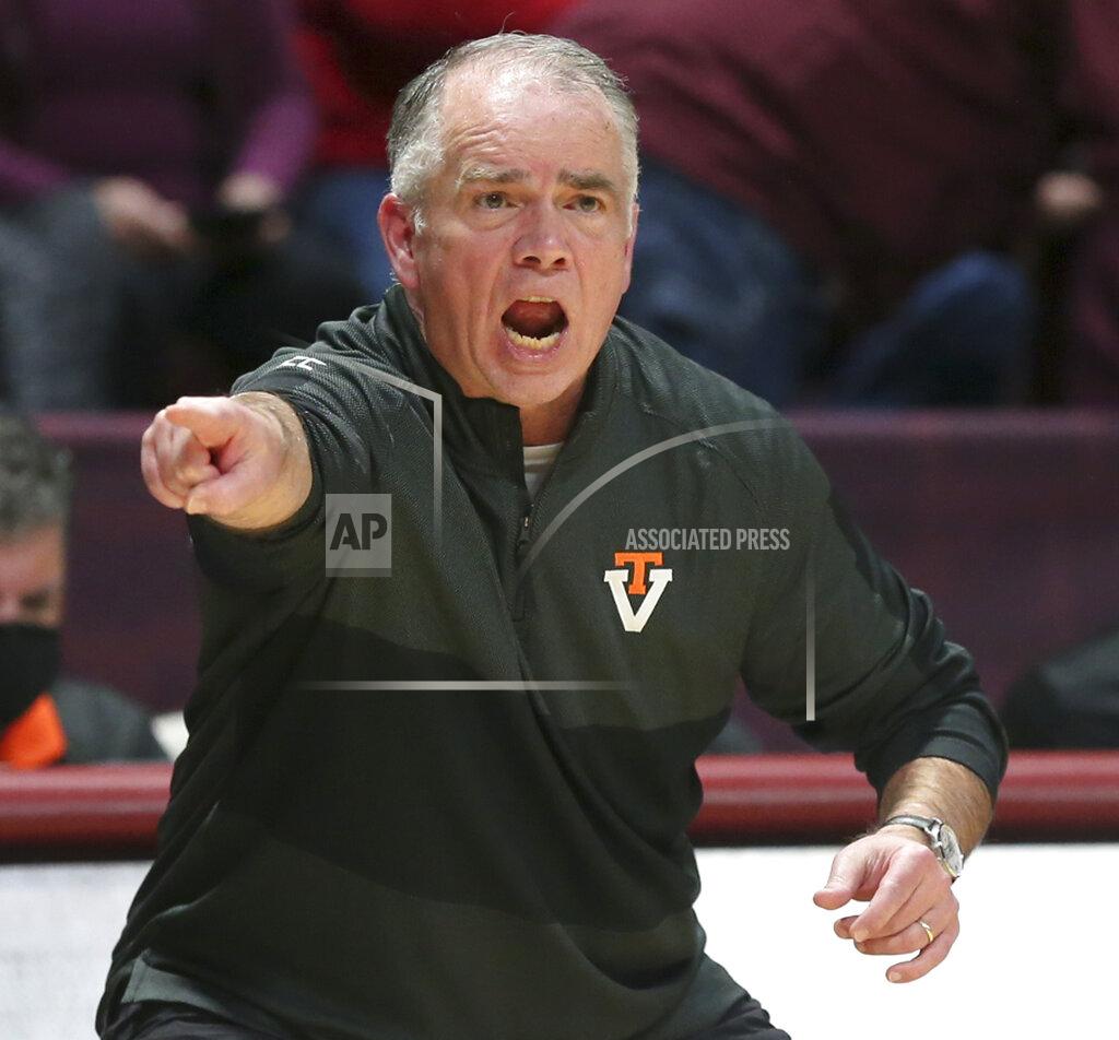 Matt Gentry Virginia Tech coach Mike Young gestures during the first half of the team's NCAA college basketball game against North Carolina State on Tuesday, Jan. 4, 2022, in Blacksburg, Va. (Matt Gentry/The Roanoke Times via AP)